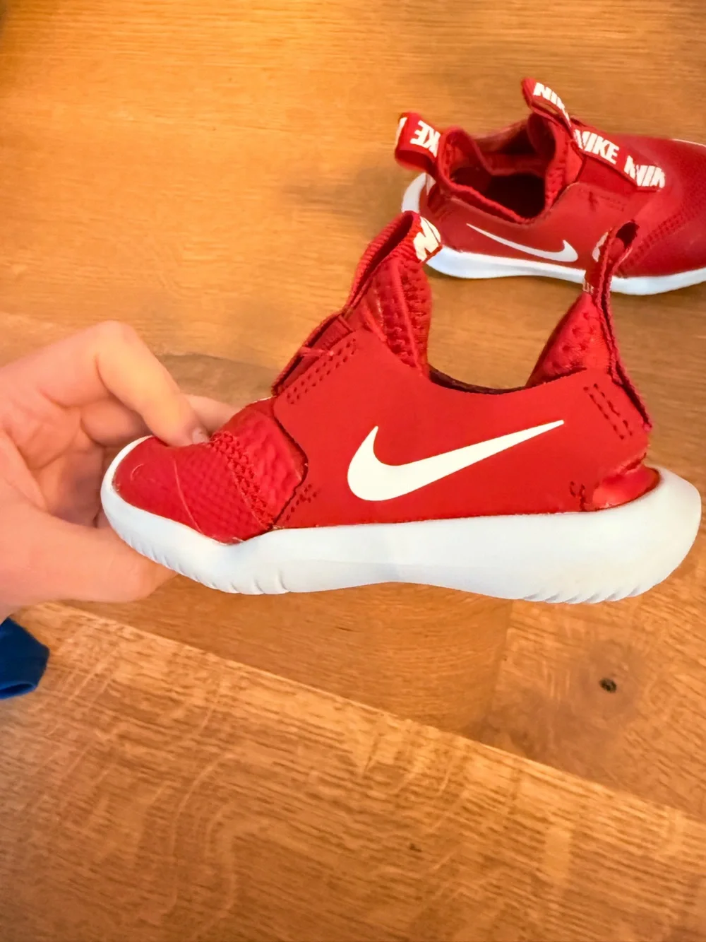 Nike Kids Red Slip-On Sneakers with White Swoosh
